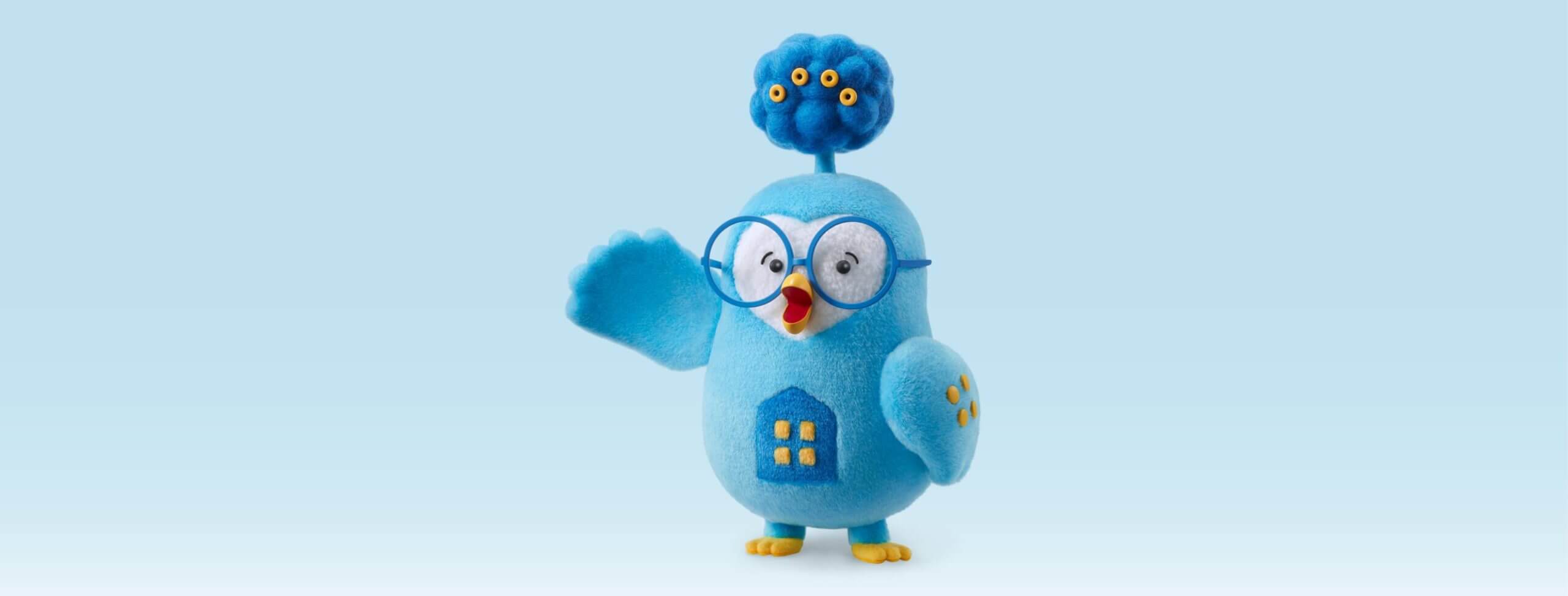 village house mascot blue owl with glasses