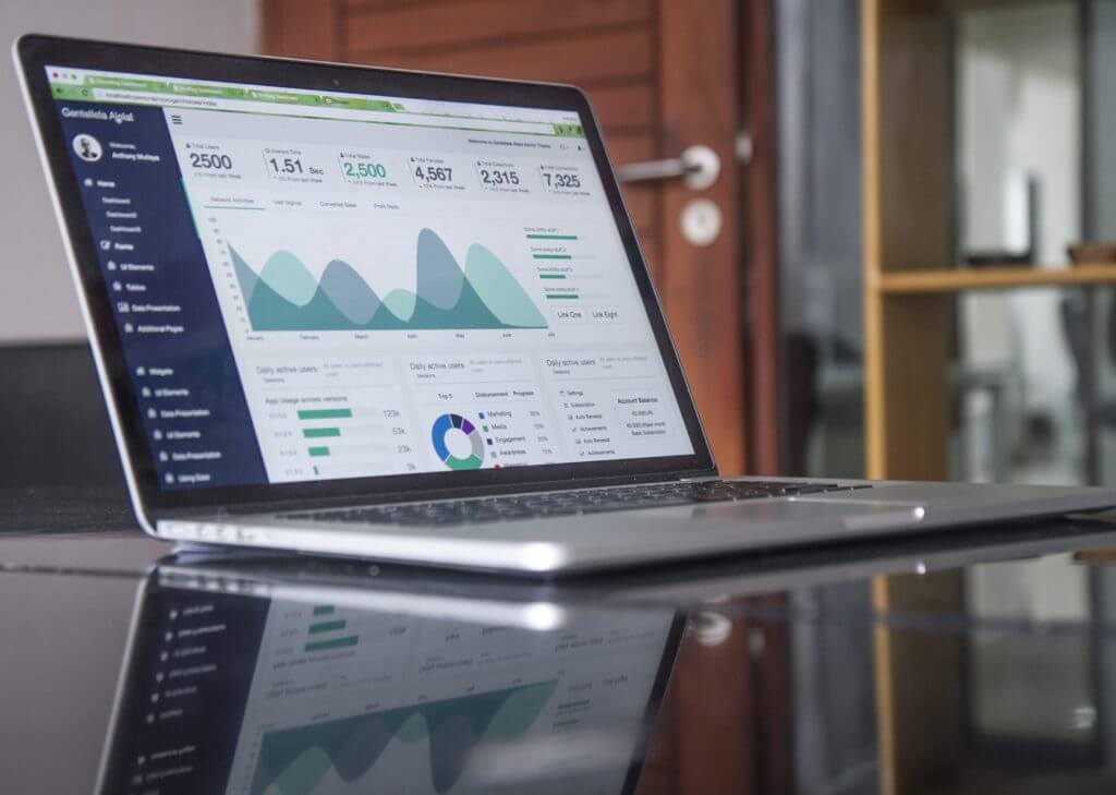 Laptop with a data report displaying on the screen